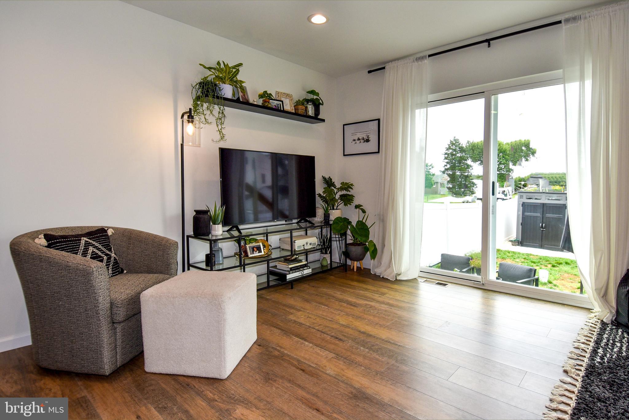 368 Winmeyer Avenue Odenton, MD 21113 - Photo 15 of 54 LIVING ROOM SLIDER DOOR W/ ACCESS TO REAR YARD