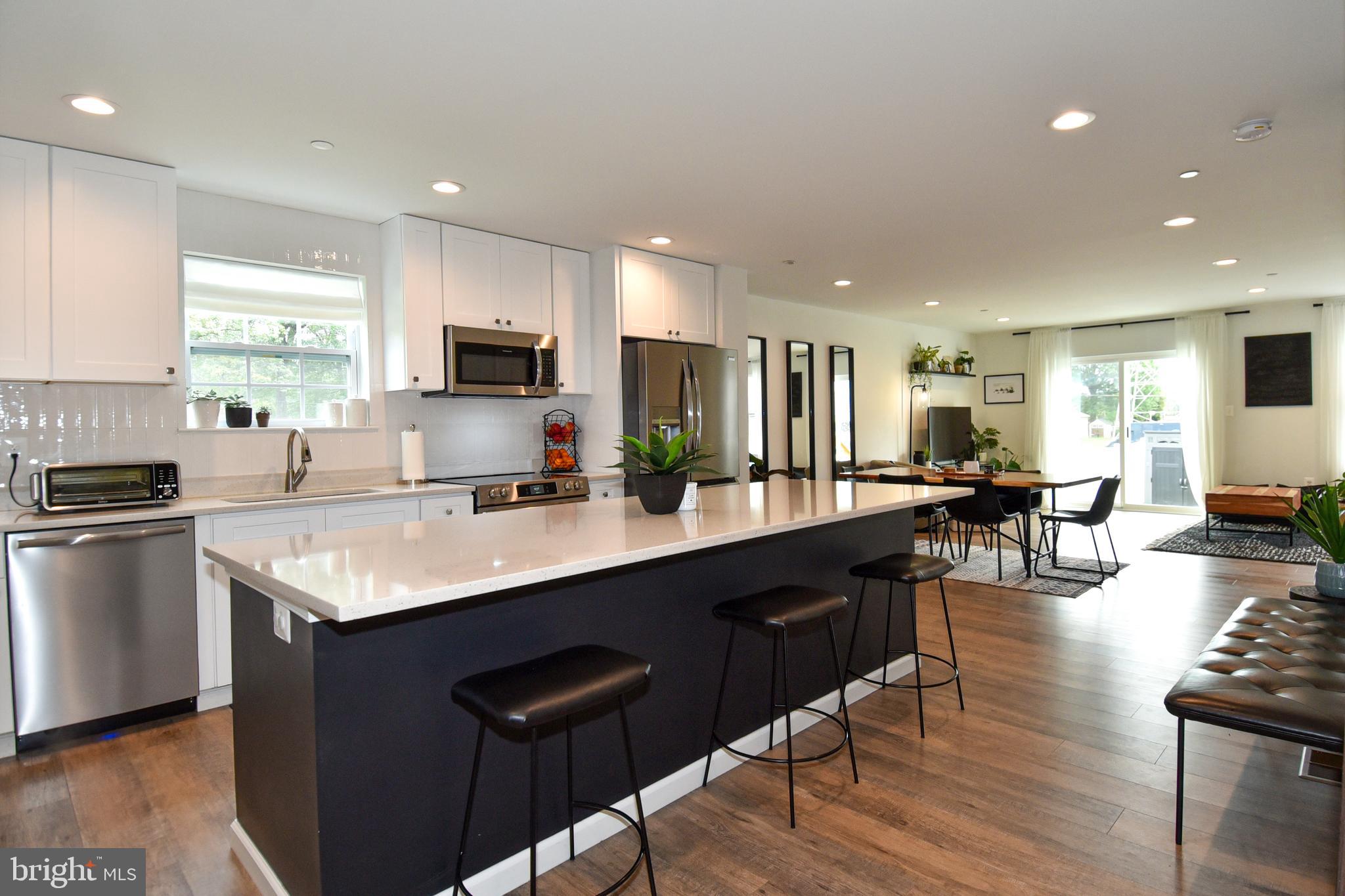 368 Winmeyer Avenue Odenton, MD 21113 - Photo 8 of 54 KITHEN ISLAND HAS QUARTZ COUNTER TOP