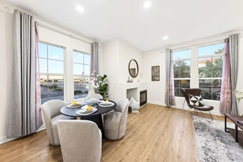 a kitchen with stainless steel appliances a stove sink and refrigerator