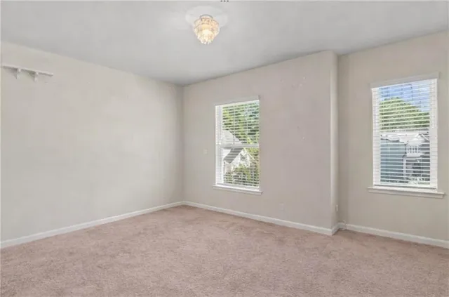 an empty room with windows