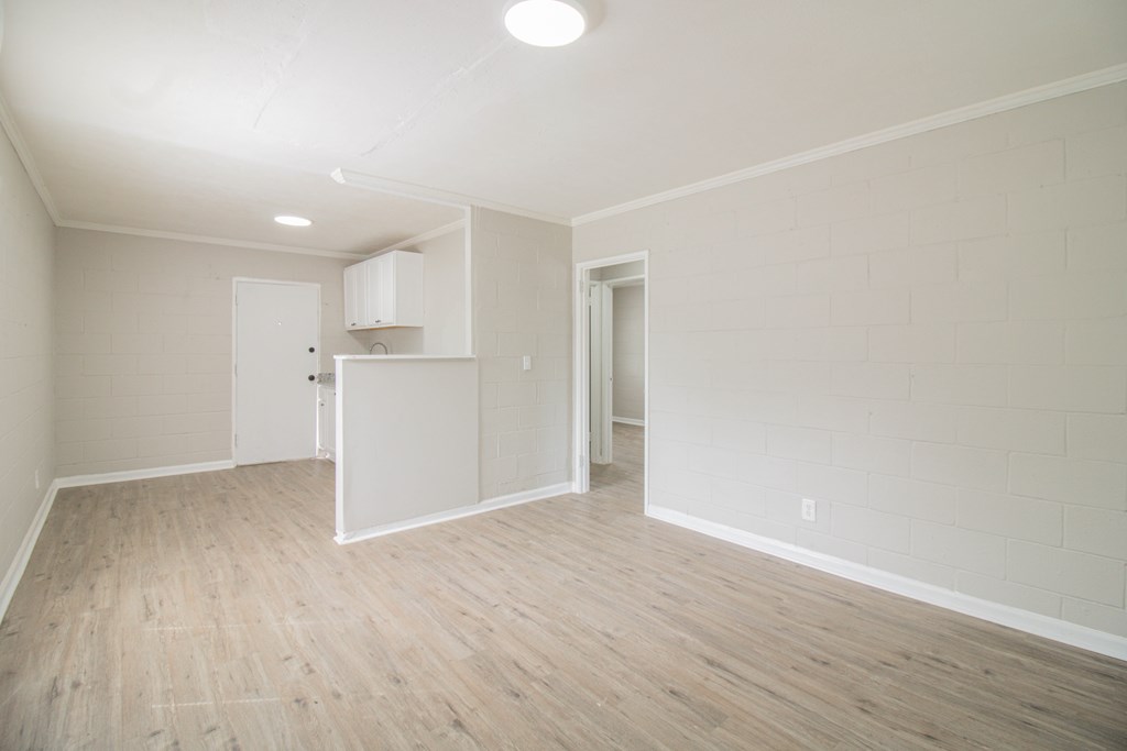 2408 16th Avenue, Unit B Columbus, GA 31901 - Photo 5 of 8 a view of empty room with wooden floor