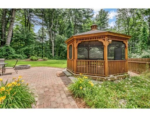 37 Packard Road Stow, MA 01775 - Photo 34 of 42 a view of a deck with a small yard