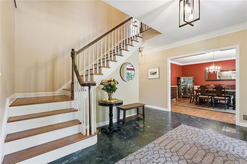 900 Settlers Ridge Road Pittsburgh, PA 15238 - Photo 22 of 50 a graceful curved staircase ascends to the second level.