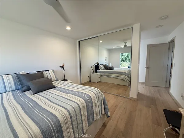 a picture of a bathroom with a sink and a mirror