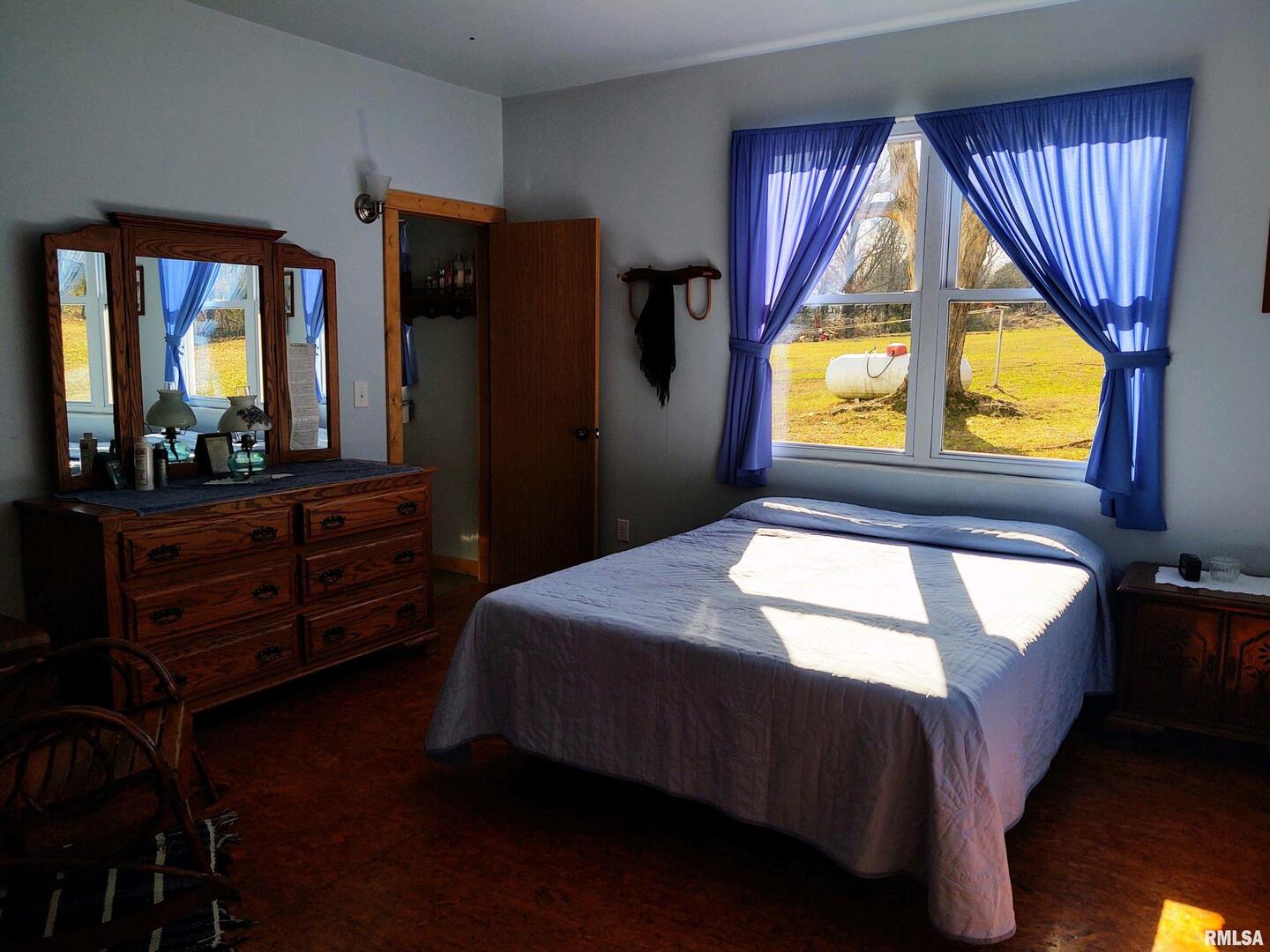 6270 Buncombe Road Buncombe, IL 62912 - Photo 17 of 71 a bedroom with a bed and window