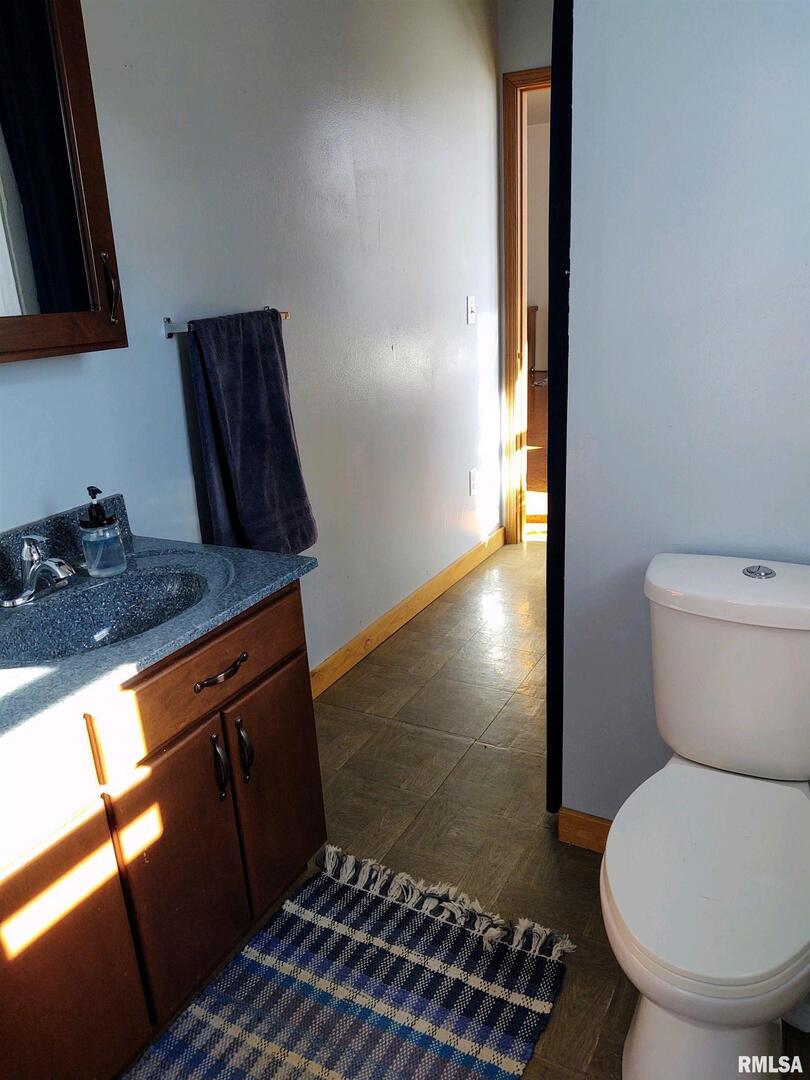 6270 Buncombe Road Buncombe, IL 62912 - Photo 25 of 71 a bathroom with a toilet and a sink
