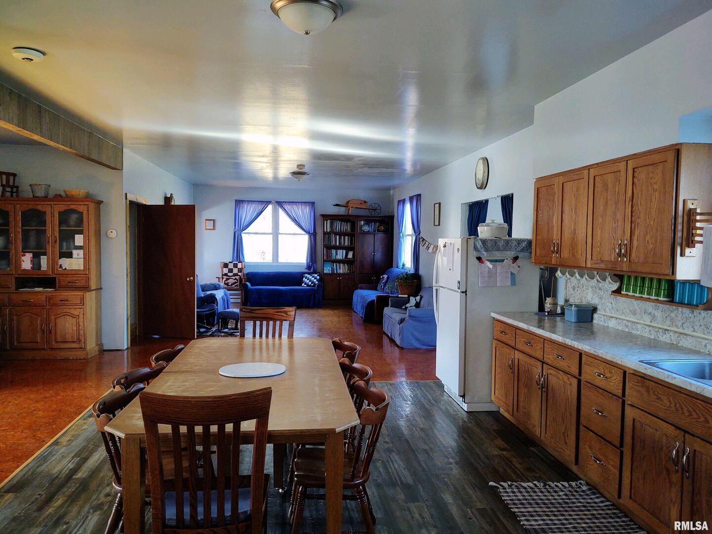 6270 Buncombe Road Buncombe, IL 62912 - Photo 3 of 71 a view of a dining room with furniture and wooden floor