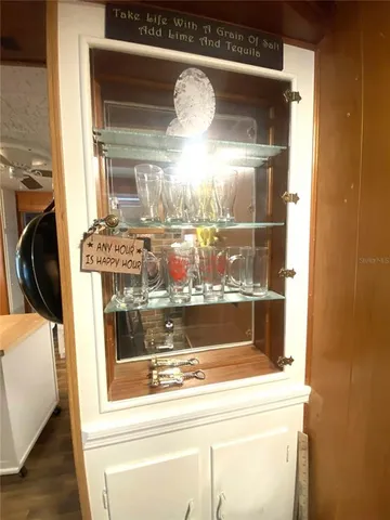 a bathroom with a sink a toilet a mirror and vanity