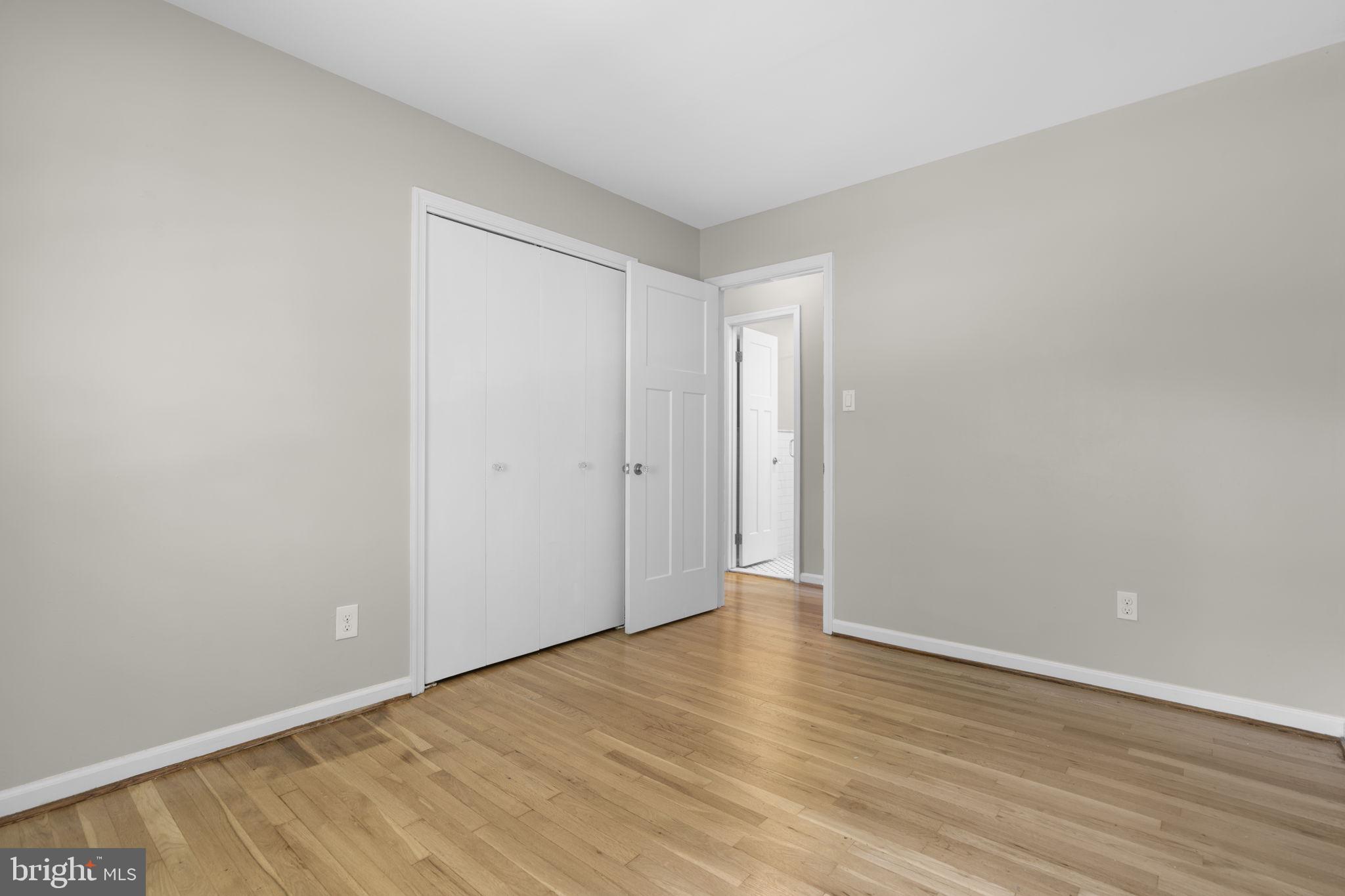 822 Loxford Terrace Silver Spring, MD 20901 - Photo 26 of 61 a view of an empty room with wooden floor