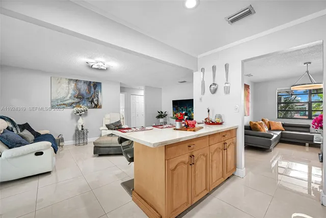a very nice looking living room with furniture and a flat screen tv