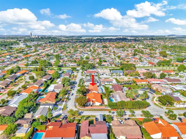 a view of city and green space