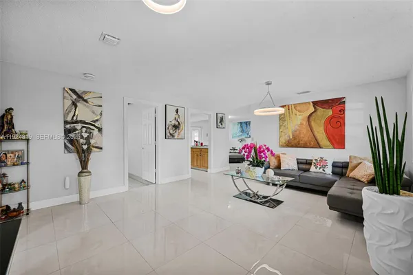 a living room with furniture and window