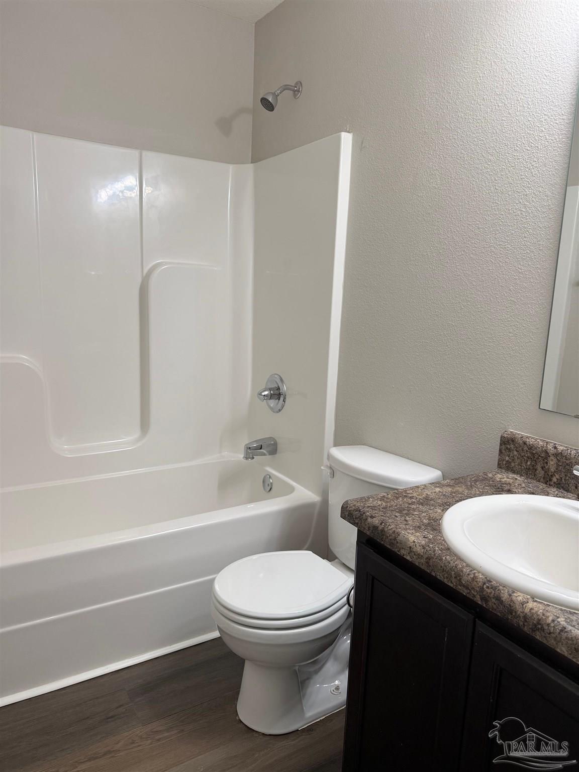 10881 Chippewa Way Pensacola, FL 32534 - Photo 13 of 16 a bathroom with a toilet a sink and bathtub