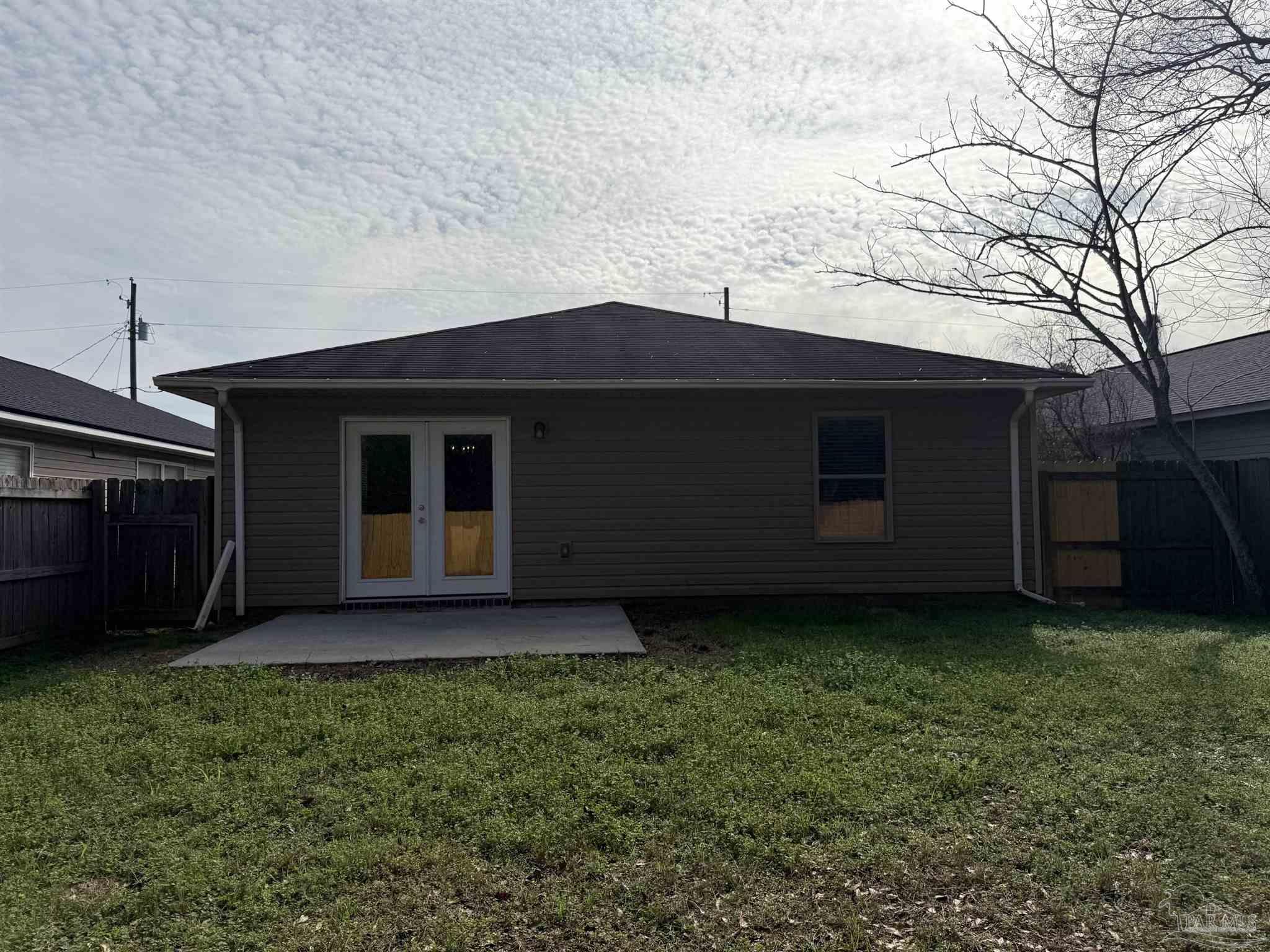 10881 Chippewa Way Pensacola, FL 32534 - Photo 16 of 16 a front view of a house with a yard