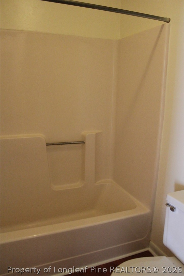7805 Gallant Ridge Drive Fayetteville, NC 28314 - Photo 15 of 25 a bathroom with a bathtub