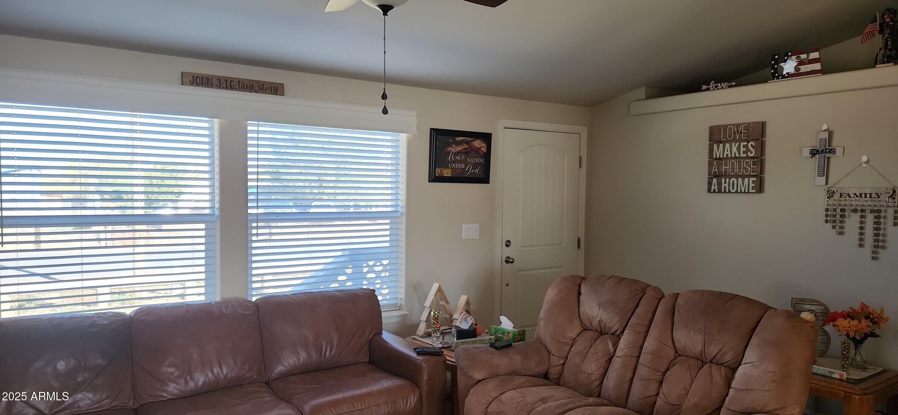 1983 Crystal Lane Springerville, AZ 85938 - Photo 14 of 27 a living room with furniture and a window