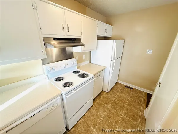 a utility room with washer and dryer