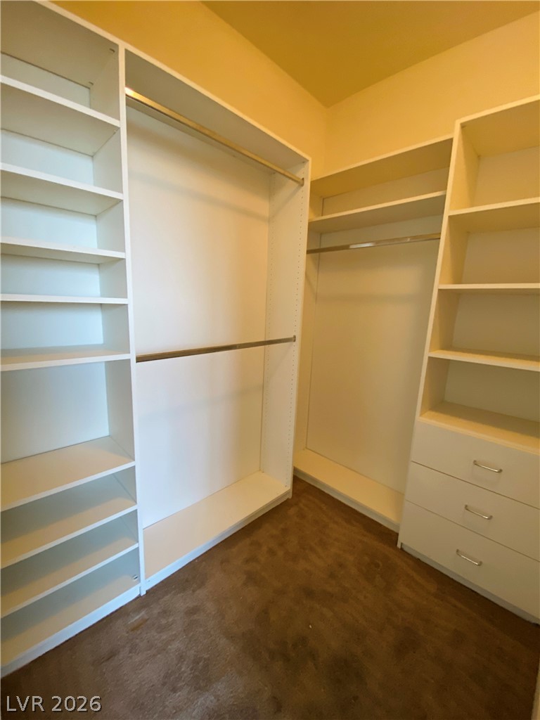 8794 Timber Mesa Street Las Vegas, NV 89139 - Photo 16 of 26 Functional custom closet system with ample storage for organization.