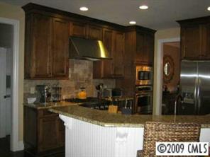 374 Nora Ridge Catawba, SC 29704 - Photo 2 of 8 a kitchen with a sink and a refrigerator