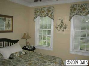 374 Nora Ridge Catawba, SC 29704 - Photo 7 of 8 a bedroom with a bed and a window