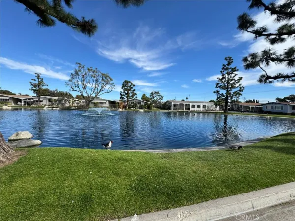 a view of a lake with houses