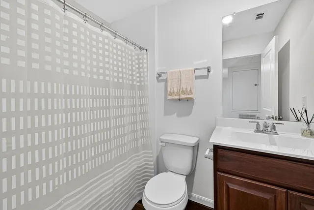 a view of a room with furniture window and a ceiling fan
