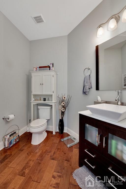 339 Ticetown Road Old Bridge, NJ 08857 - Photo 17 of 44 a bathroom with a sink toilet and a mirror