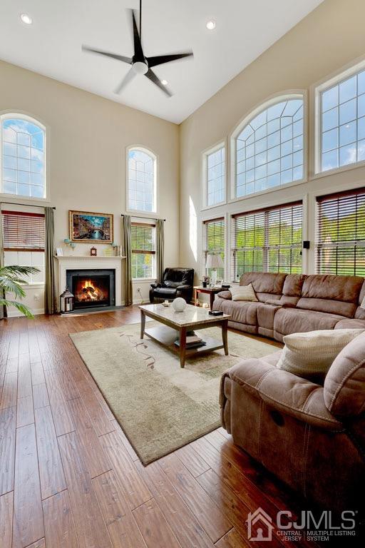 339 Ticetown Road Old Bridge, NJ 08857 - Photo 20 of 44 a living room with furniture and a fireplace
