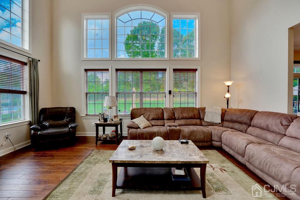 339 Ticetown Road Old Bridge, NJ 08857 - Photo 21 of 44 a living room with furniture and a large window