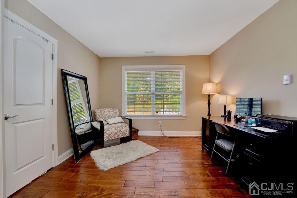 339 Ticetown Road Old Bridge, NJ 08857 - Photo 26 of 44 a living room with furniture and a window