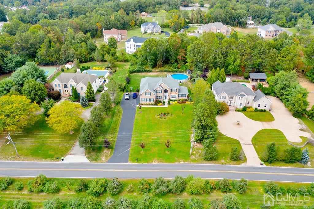 339 Ticetown Road Old Bridge, NJ 08857 - Photo 42 of 44 an aerial view of residential houses with outdoor space and swimming pool