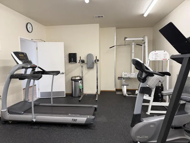 a gym room with gym equipment