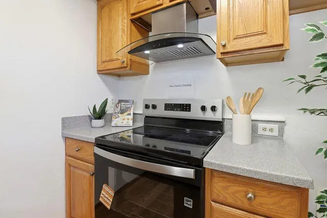 a bedroom with a bed and a mirror