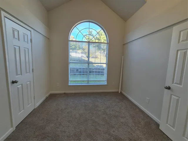 an empty room with a window