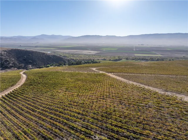 a view of an ocean and a mountain