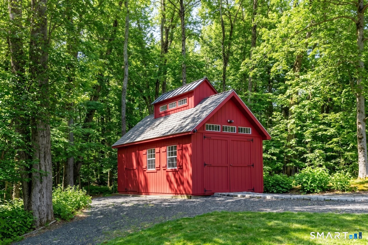 9 Old Paddock Lane Kent, CT 06785 - Photo 27 of 28 a house with trees in the background