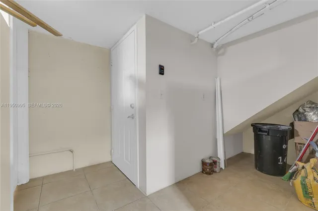 a utility room with washer and dryer