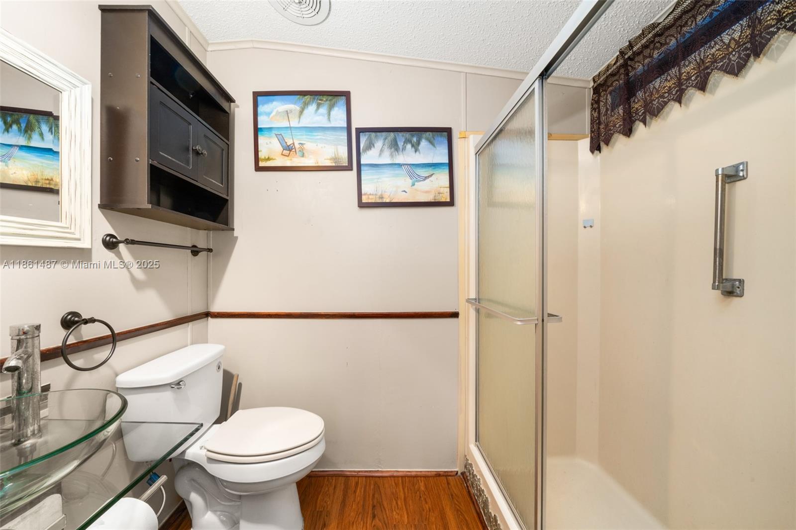 1145 Bluejay Road Wauchula, FL 33873 - Photo 14 of 42 a bathroom with a toilet sink and tub