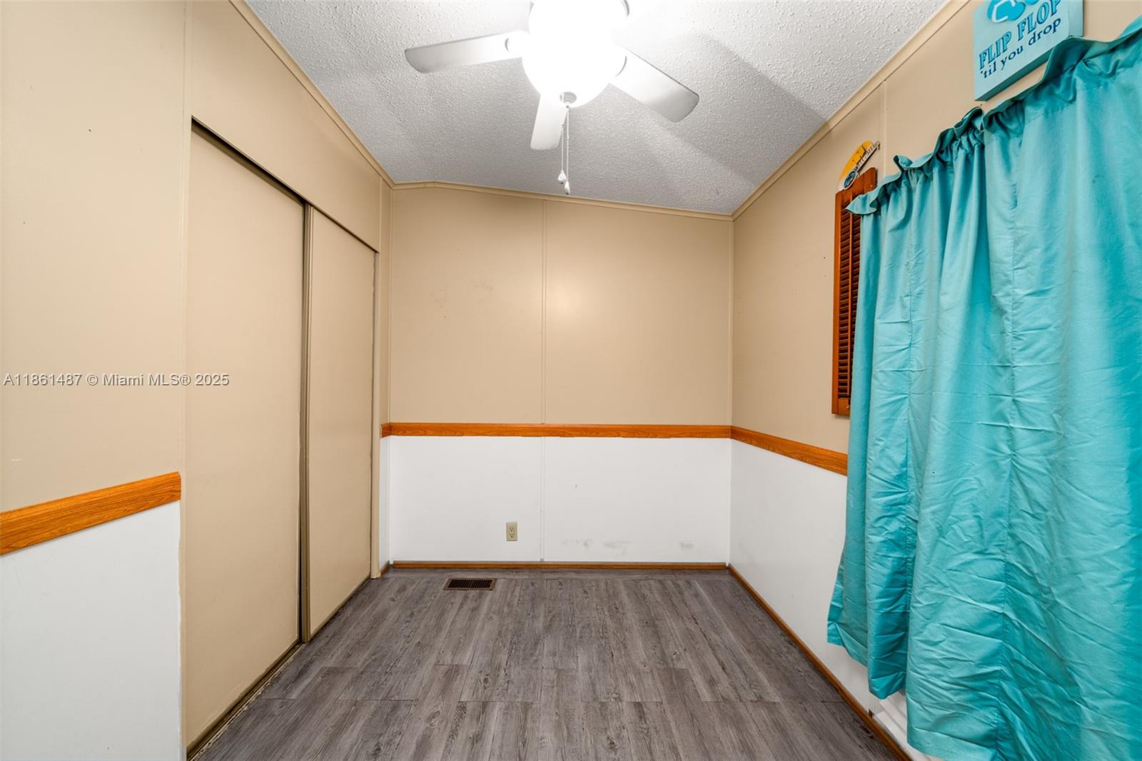 1145 Bluejay Road Wauchula, FL 33873 - Photo 17 of 42 a view of hallway with stairs and wooden floor