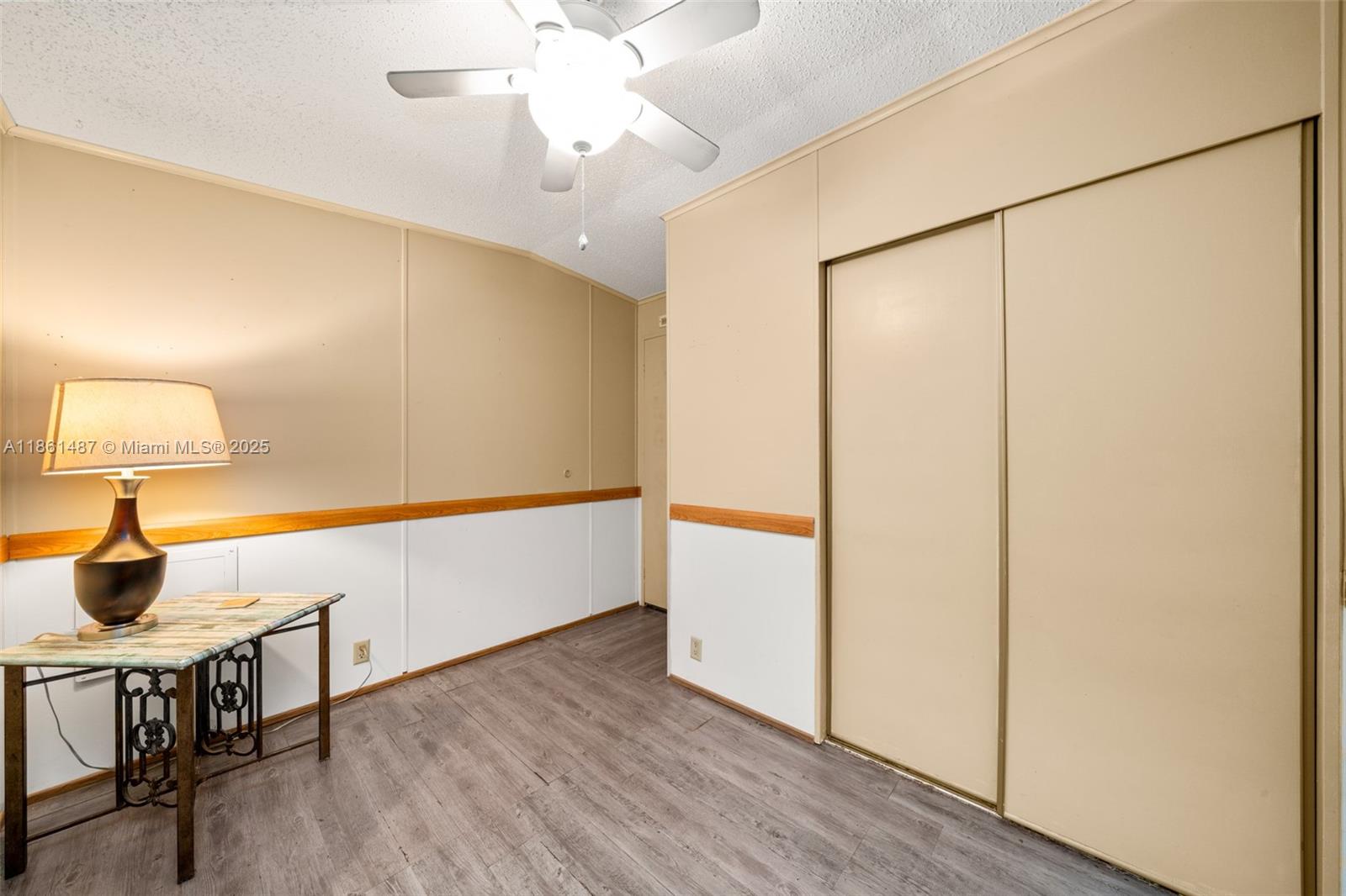 1145 Bluejay Road Wauchula, FL 33873 - Photo 18 of 42 a view of a workspace with furniture and wooden floor