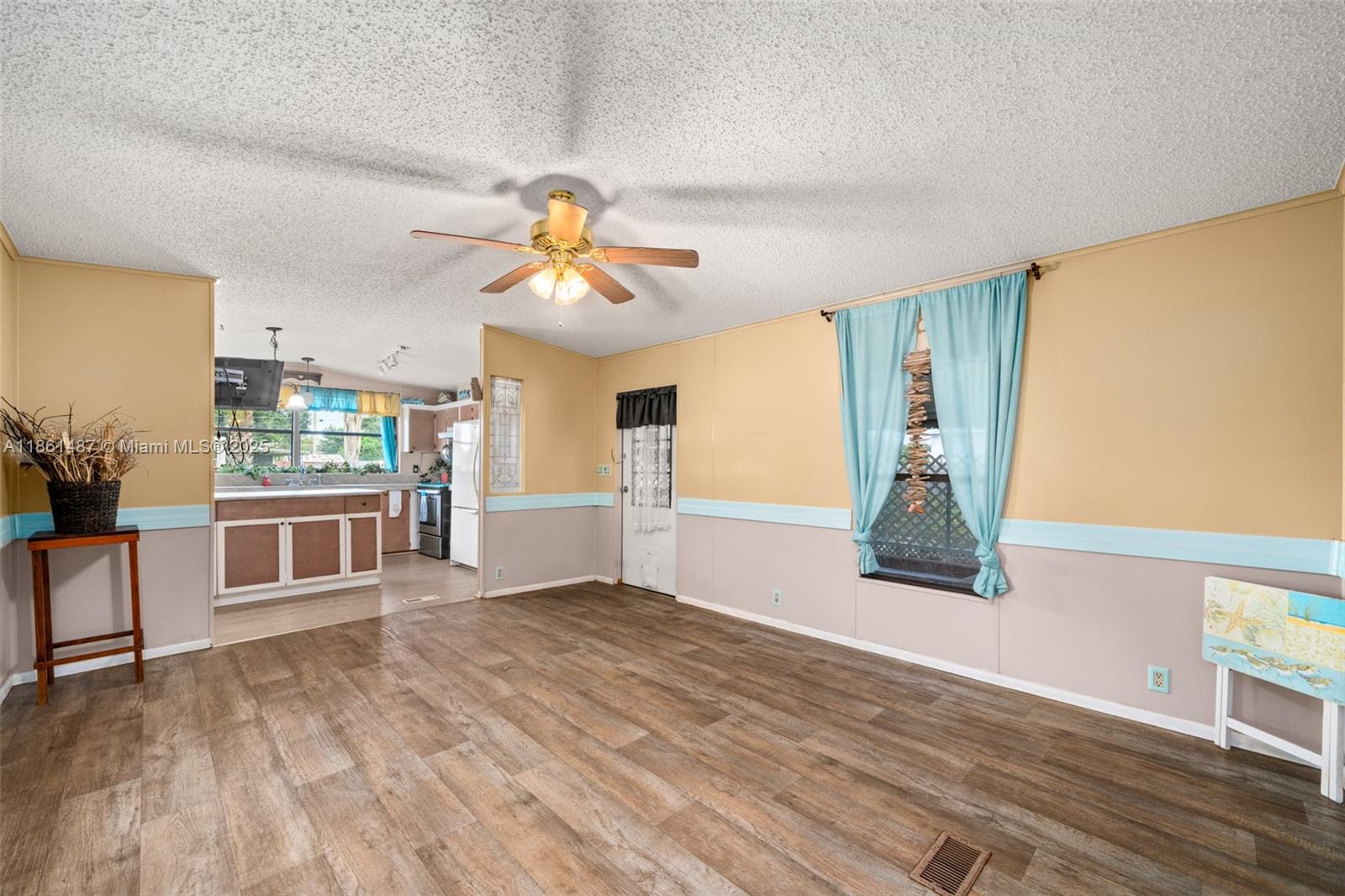 1145 Bluejay Road Wauchula, FL 33873 - Photo 3 of 42 a view of an empty room with a window