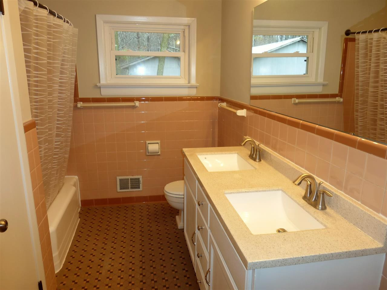 2314 Carpenter Pond Road Raleigh, NC 27613 - Photo 9 of 12 Newly Installed Double Vanity. New Lighting. Bath/Shower. Bathroom