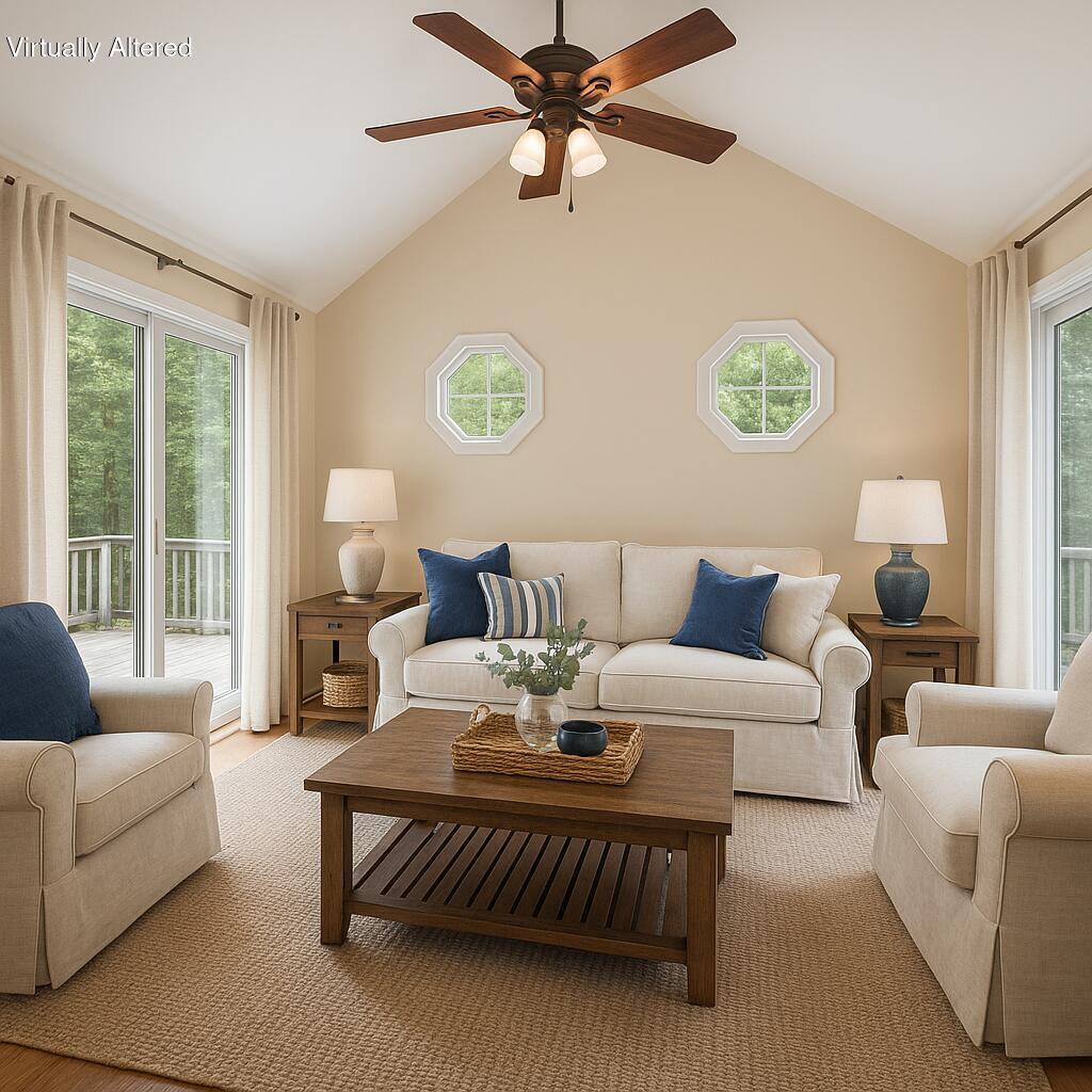 66 Chuckles Way Marstons Mills, MA 02648 - Photo 15 of 32 a living room with furniture and a large window