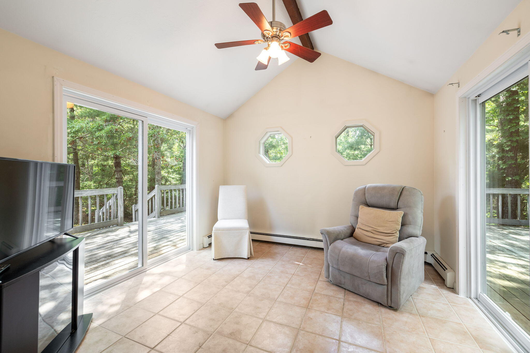 66 Chuckles Way Marstons Mills, MA 02648 - Photo 17 of 32 a living room with furniture and a window