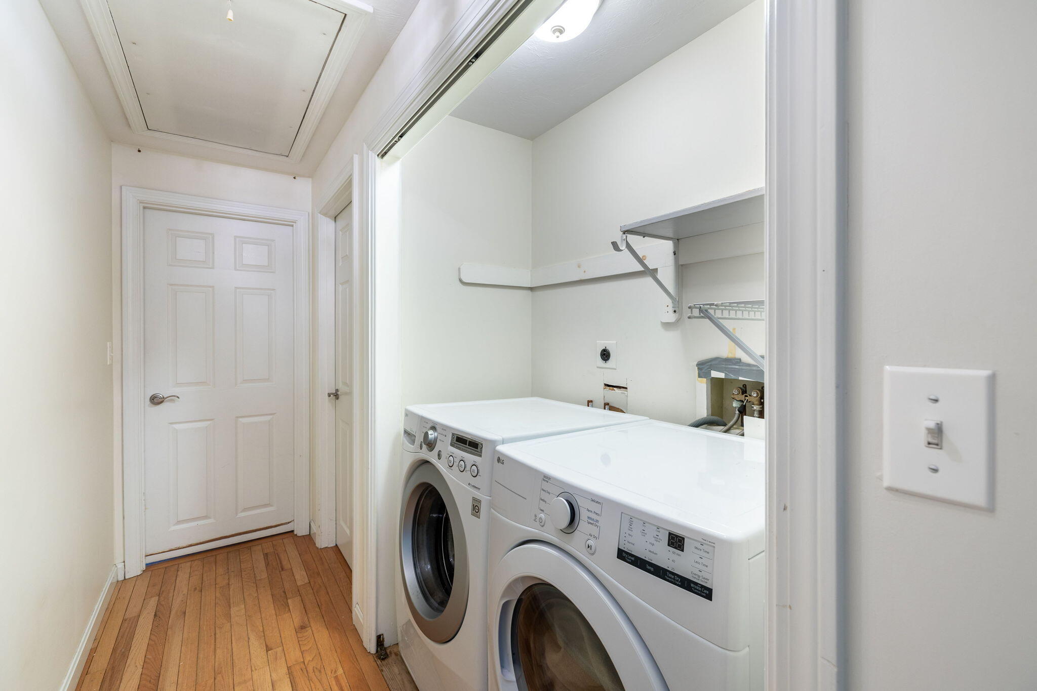 66 Chuckles Way Marstons Mills, MA 02648 - Photo 19 of 32 a view of a storage & utility room with dryer and washer