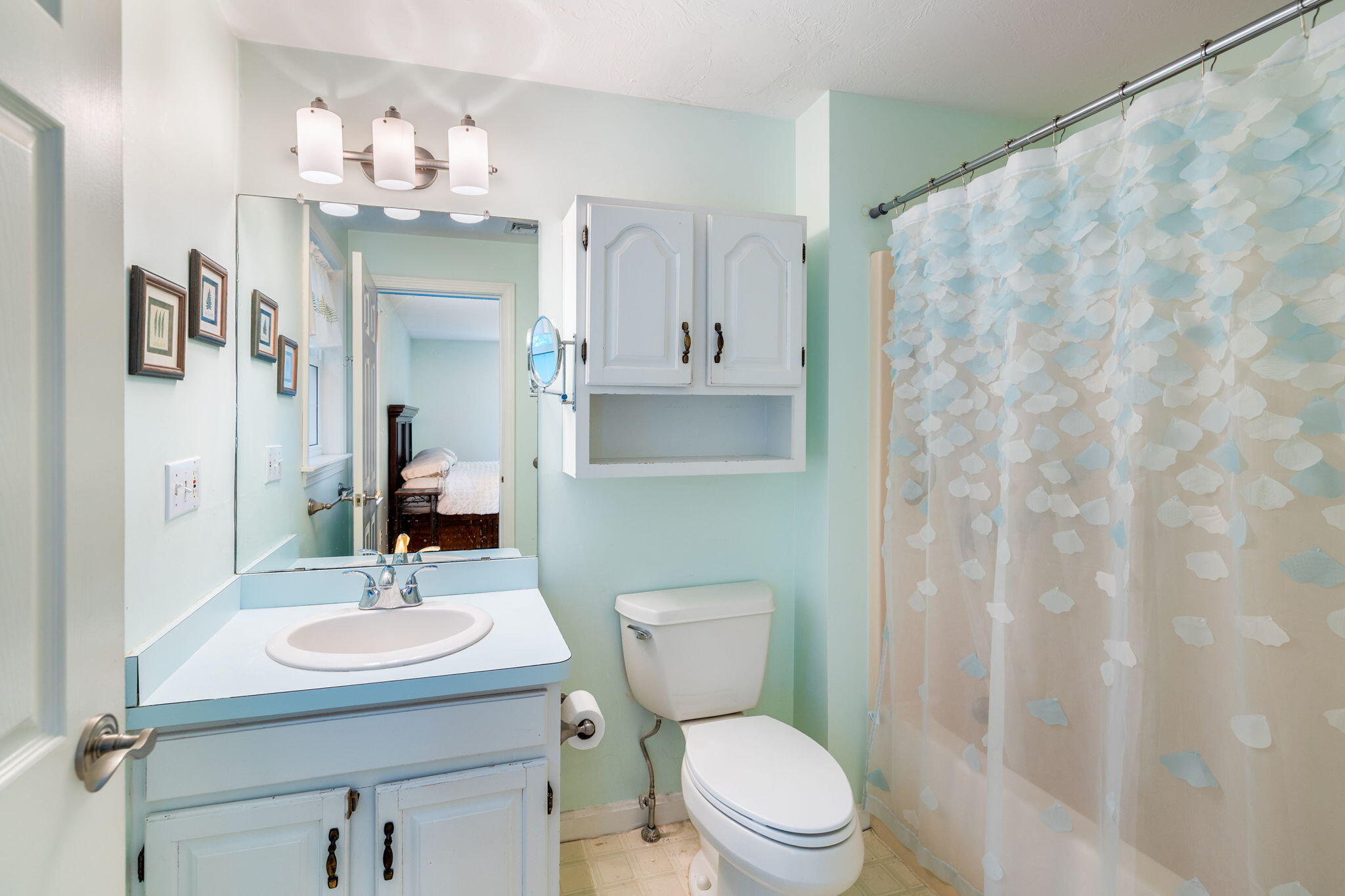 66 Chuckles Way Marstons Mills, MA 02648 - Photo 22 of 32 a bathroom with a sink a toilet and mirror