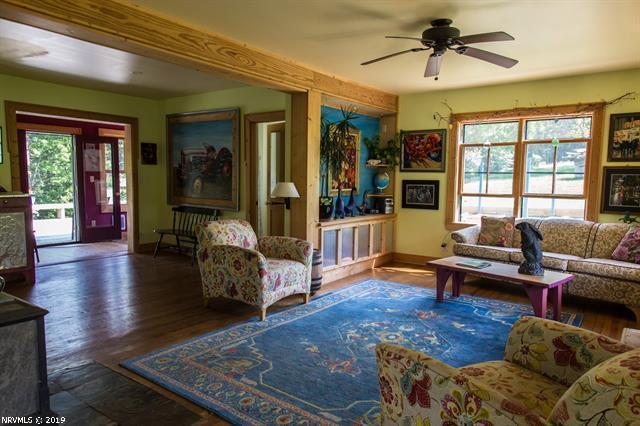 2094 Union School Road Southwest Willis, VA 24380 - Photo 2 of 40 a living room with furniture and a large window