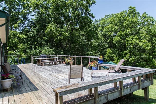 2094 Union School Road Southwest Willis, VA 24380 - Photo 16 of 40 a view of house with deck and outdoor seating