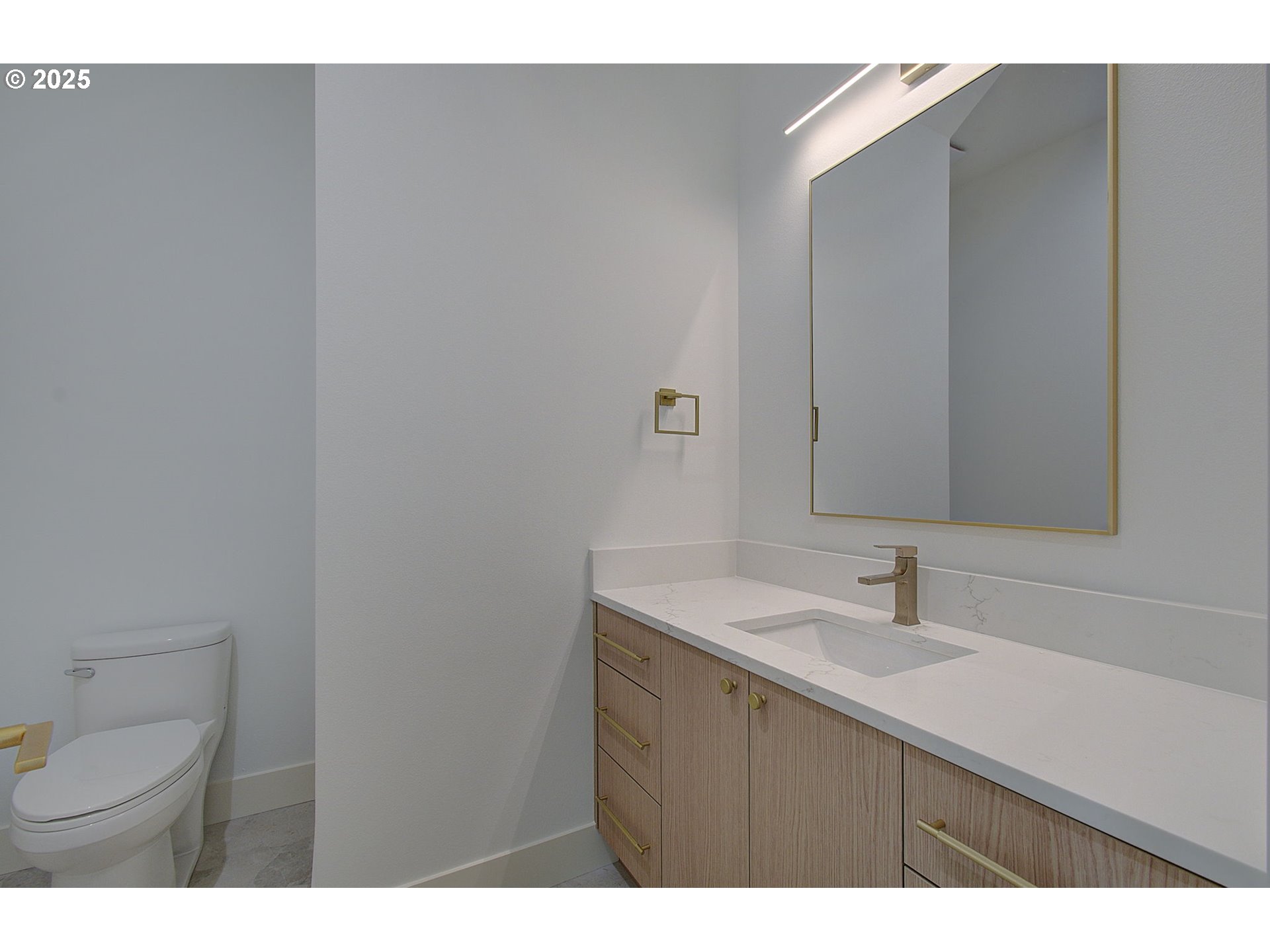 2012 Northeast 159th Street Ridgefield, WA 98642 - Photo 11 of 47 a bathroom with a sink and a mirror