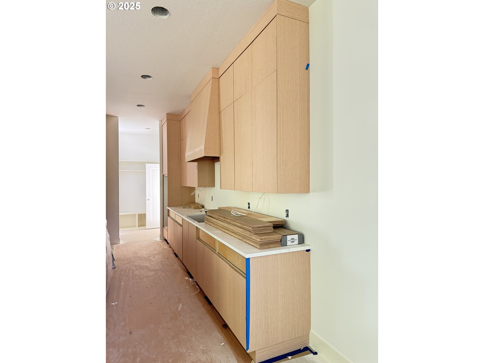 2012 Northeast 159th Street Ridgefield, WA 98642 - Photo 2 of 47 a kitchen with a sink and cabinets